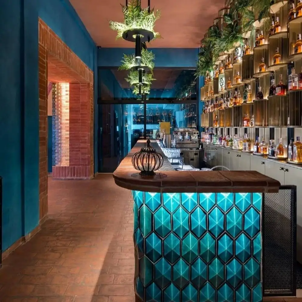 High-End L-Shape Cocktail Bar Table — in-situ view with brick wall