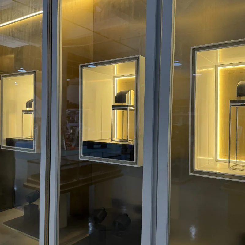 Italian Glass Display Cabinet, Beech & Steel — close-up detail of gold finish