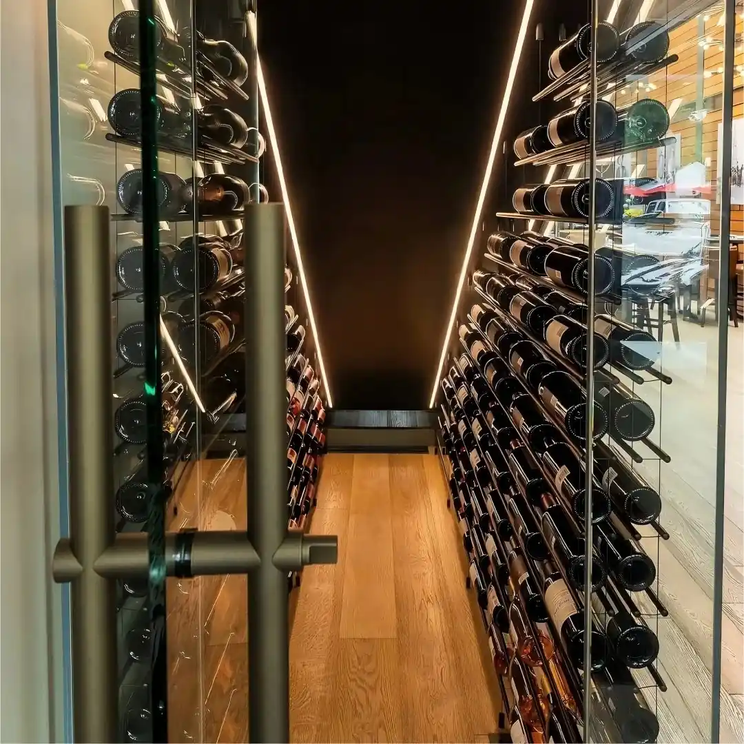 Under-Stair Glass Wine Cellar Enclosure — interior layout with shelving