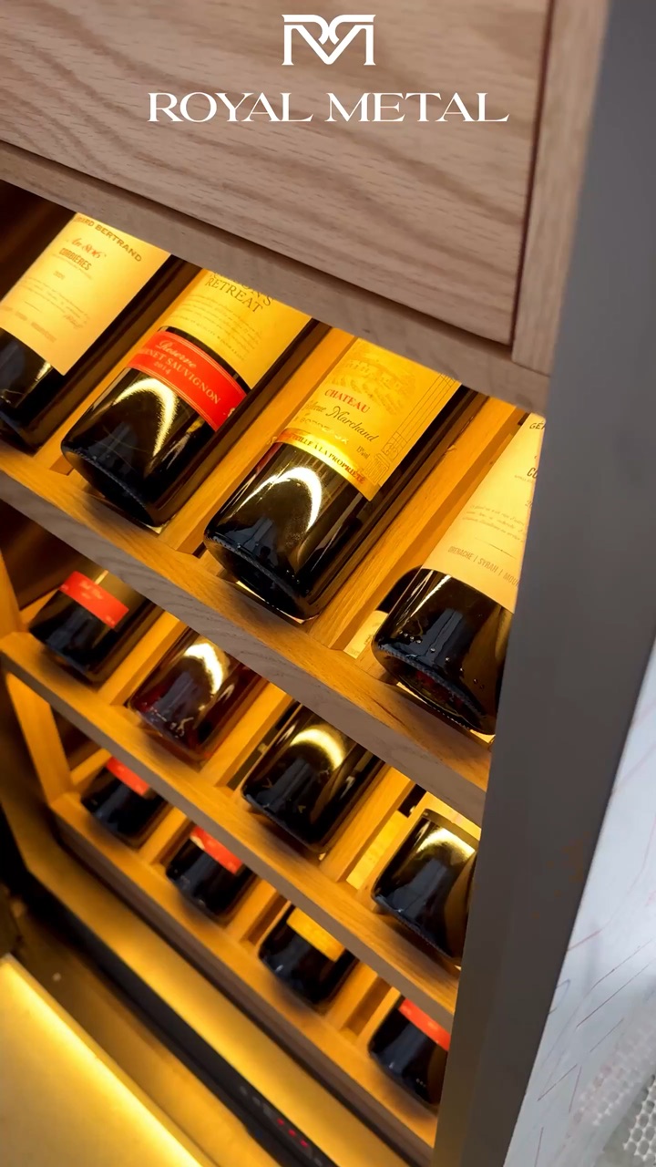 Metal wine display rack inserts in a home wine wall — video still